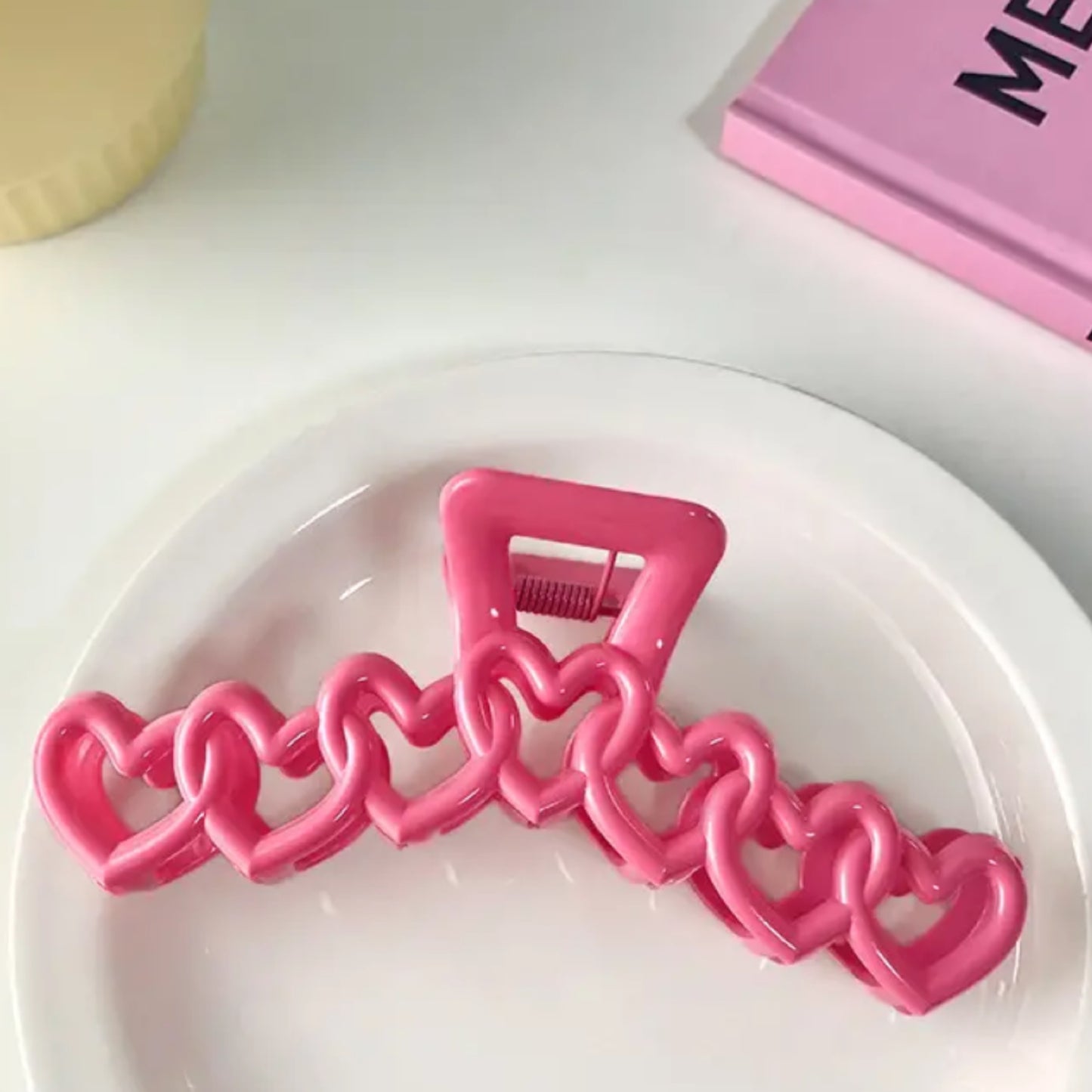 Linked hearts hair clip